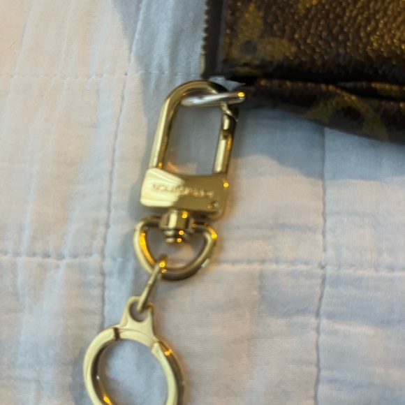Louis Vuitton Monogrammed Wristlet “Pouchette” - Picture 7 of 9